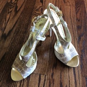 Peep toe snake skin heels